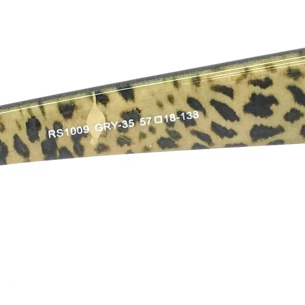 Rampage Sunglasses RS10009 GRY-35 Black Brown Cat Eye Frames with Purple Lenses